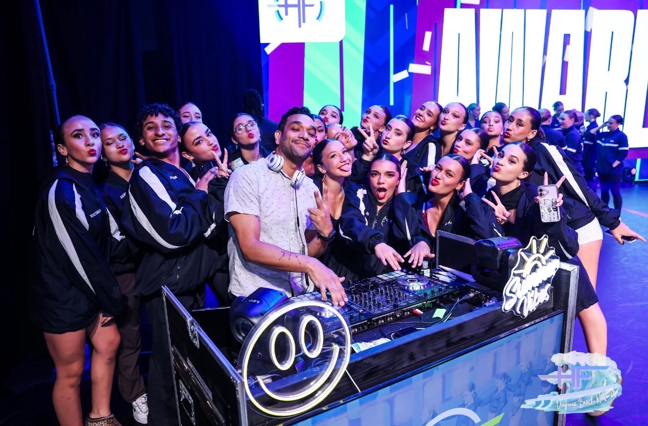 Team Pulse celebrating with DJ at Hall of Fame Nationals
