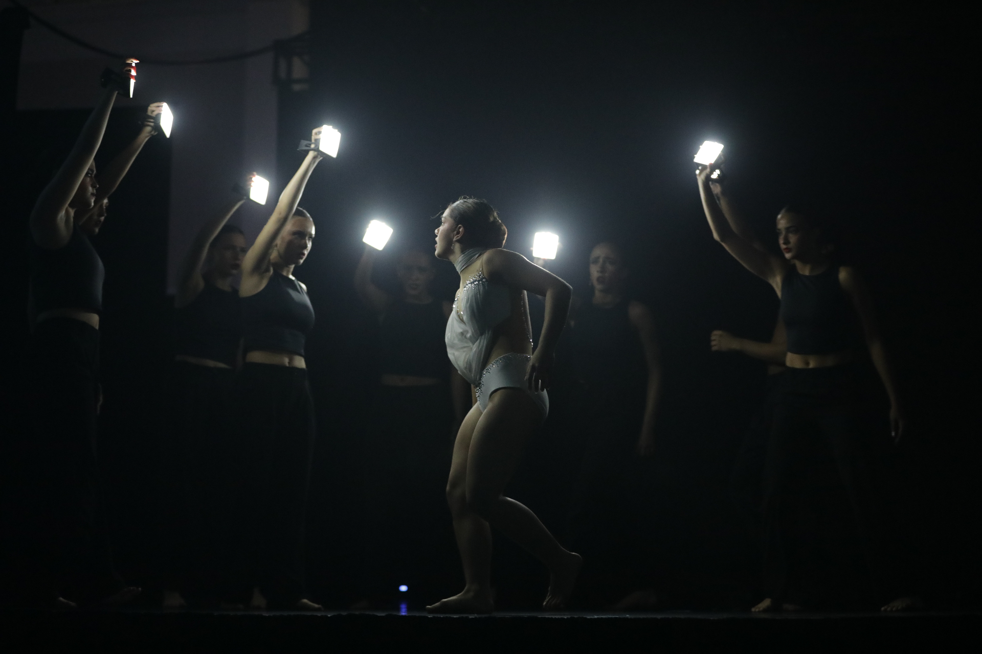 Team Pulse competition dancers performing on stage