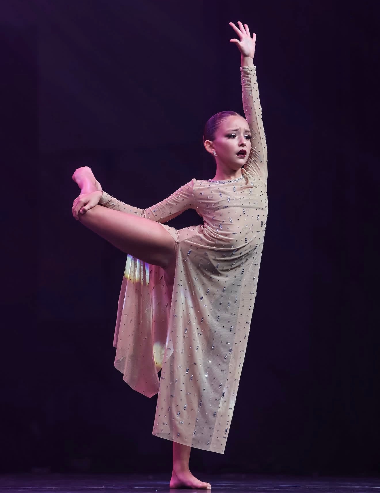 Lyrical soloist in sparkling nude costume